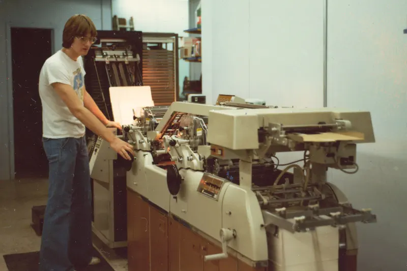 An old photo of a Thomas employee from the '70s